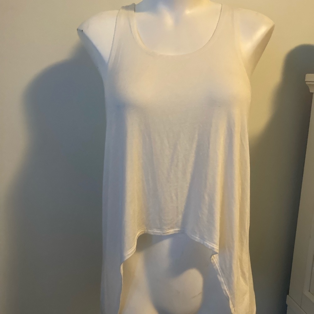 Small white adidas tank top​​​​​​​​​​​​